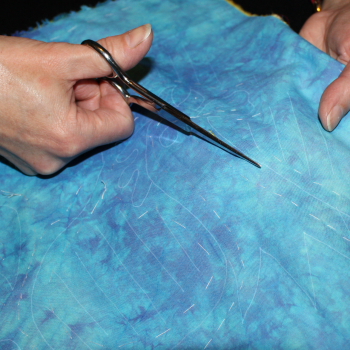 Cut through the top layer of fabric